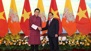 Thủ tướng Chính phủ Phạm Minh Chính và Quốc vương Bhutan Jigme Khesar Namgyel Wangchuck. (Ảnh: TRẦN HẢI)