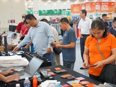 Nhiều chương trình xúc tiến thương mại được tổ chức để đẩy mạnh tiêu dùng nội địa. Ảnh: NAM NGUYỄN