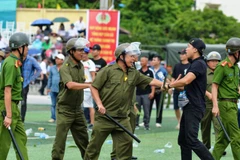 Lực lượng bảo vệ an ninh trật tự ở cơ sở thành phố Hải Phòng phối hợp diễn tập xử lý tình huống về an ninh trật tự tại cơ sở. (Ảnh: Công an Hải Phòng)