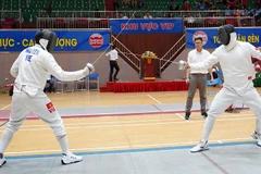 Trận chung kết nội dung nam kiếm ba cạnh giữa vận động viên Nguyễn Phước Đến và Nguyễn Tiến Nhật cùng của đoàn thành phố Hồ Chí Minh.