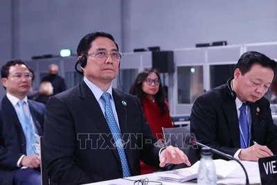 Thủ tướng Chính phủ Phạm Minh Chính dự Hội nghị Thượng đỉnh khí hậu được tổ chức trong khuôn khổ Hội nghị lần thứ 26 các Bên tham gia Công ước khung của Liên hợp quốc về Biến đổi khí hậu (COP26). (Ảnh: Dương Giang-TTXVN)