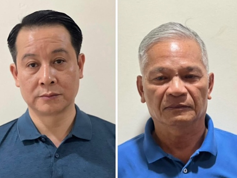 Bị can Phạm Hoàng Anh (bên trái) và bị can Lê Viết Chữ (bên phải).