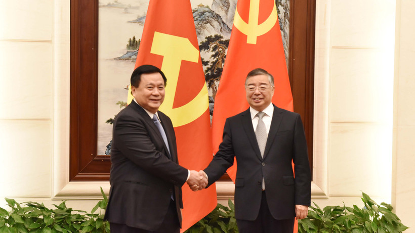 Đồng chí Nguyễn Xuân Thắng hội đàm với đồng chí Lý Thư Lỗi.