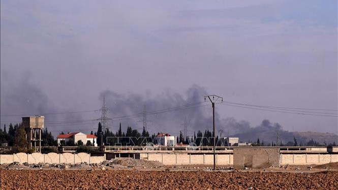 Khói bốc lên sau cuộc không kích của Israel tại Damascus, Syria vào ngày 12/12/2024. Ảnh: THX/TTXVN