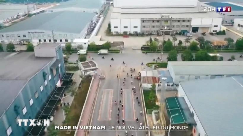 Hình ảnh trong phóng sự của TF1 mô tả vùng ven Hà Nội được ví như "đại lộ Champs-Élysées công nghiệp của miền bắc Việt Nam". (Ảnh: TTXVN phát)