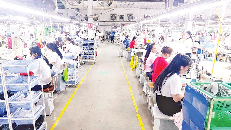 Gần 90% công nhân Công ty cổ phần giày Thiên Lộc, Quận 12 đi làm trở lại sau kỳ nghỉ Tết Nguyên đán.