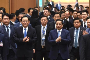 Thủ tướng Phạm Minh Chính và Thủ tướng Lào Sonexay Siphandone dự Hội nghị hợp tác đầu tư Việt Nam-Lào 2024 (Ảnh: TRẦN HẢI) 