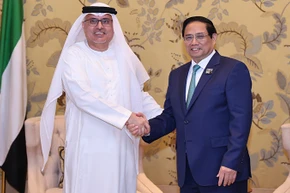 Thủ tướng Chính phủ Phạm Minh Chính và Bộ trưởng Nguồn nhân lực UAE Abdulrahman Abdumannan Al-Awar.