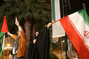 Người dân Iran đổ xuống đường sau vụ tấn công vào Israel. (Ảnh: Reuters) 