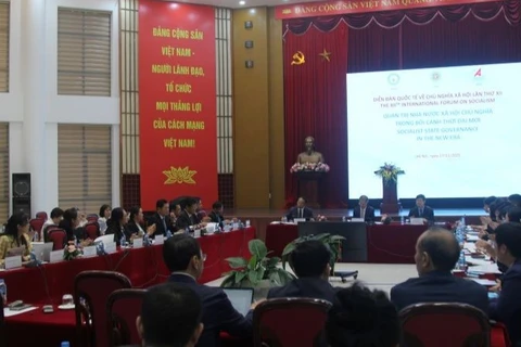 Các nhà khoa học trong phiên thảo luận tại Diễn đàn quốc tế về chủ nghĩa xã hội lần thứ XII.