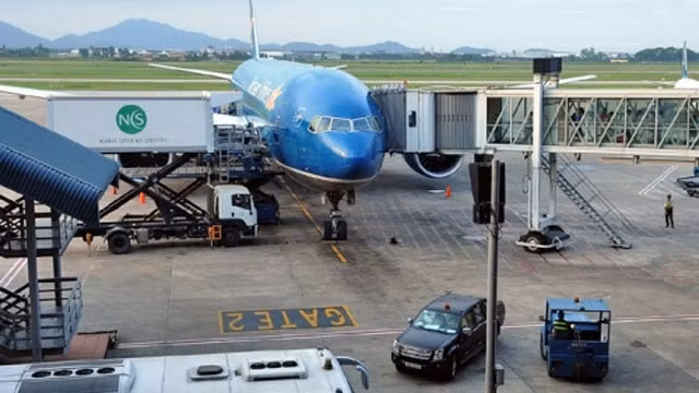 Máy bay của Vietnam Airlines tại sân bay Nội Bài (Hà Nội). Ảnh: NGUYỄN ÐĂNG