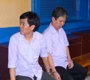 Hai bị cáo Trần Bỉnh Tâm và Nguyễn Hữu Tài.
