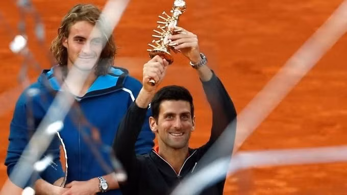 Novak Djokovic ăn mừng danh hiệu Madrid Open thứ ba trong sự nghiệp. (Ảnh: Reuters)
