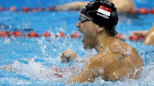 Joseph Schooling ăn mừng chiến thắng. (Ảnh: Reuters)