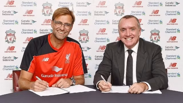 HLV J. Klopp (trái).