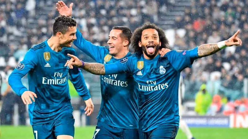 Ronaldo (trái) và Marcelo (phải) cùng tỏa sáng, giúp Real Madrid thắng Juventus 3-0.