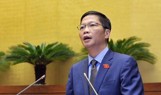 Bộ trưởng Công thương Trần Tuấn Anh trình bày Tờ trình về dự án Luật Cạnh tranh (sửa đổi).