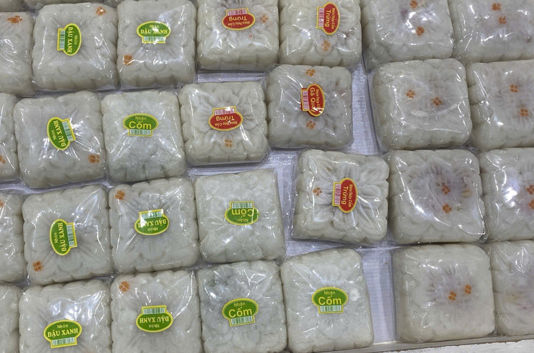 Một mẻ bánh dẻo mang hương vị quê hương mộc mạc của gia đình nghệ nhân Tô Văn Thân. tt21.jpg