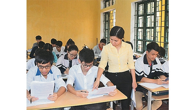 Học sinh Trường THPT Nguyễn Thái Học (TP Vĩnh Yên, Vĩnh Phúc) trong giờ ôn tập chuẩn bị cho kỳ thi THPT quốc gia. Ảnh: TIẾN ĐỨC