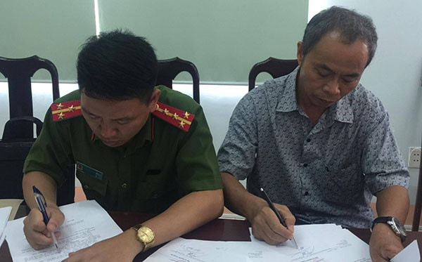 Ông Ngô Quốc Vinh tại cơ quan Công an.