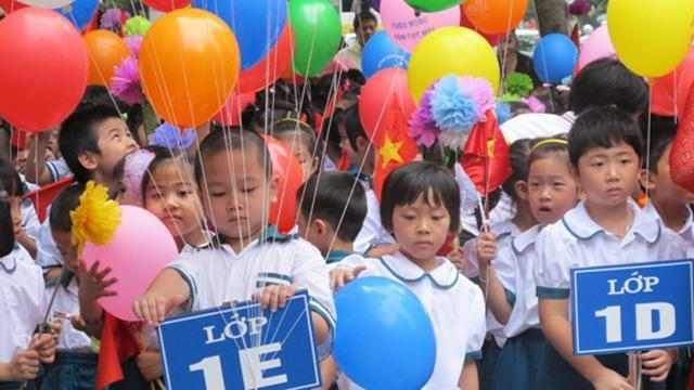 Học sinh trường Tiểu học Phan Chu Trinh (Q.Ba Đình,HN) trong ngày khai giảng. Ảnh: L.H