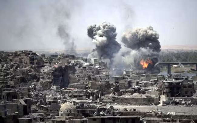 Hiện trường các vụ không kích ở Iraq.