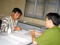 Bình "kiểm" tại trụ sở công an.