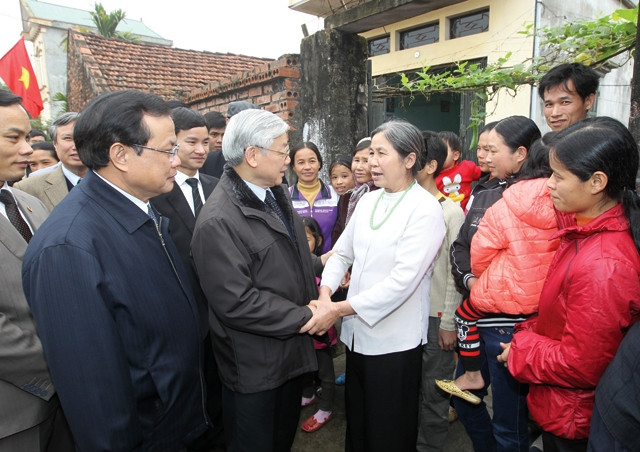 Tổng Bí thư Nguyễn Phú Trọng với nhân dân huyện Thạch Thất (TP. Hà Nội).Ảnh: TRÍ DŨNG - TTXVN