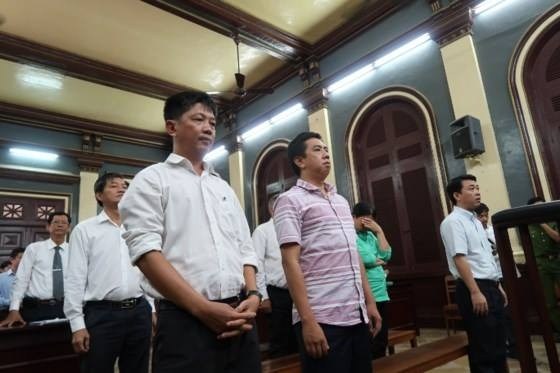 Các bị cáo nghe tuyên án. (Ảnh: SGGP)