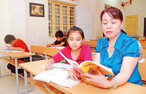 Gần 20 năm dạy học cho trẻ em lang thang cơ nhỡ, cô giáo Nguyễn Thị Minh Hồng, Mái ấm 19/5 luôn hết lòng vì học sinh thân yêu. Ảnh: DUY LINH