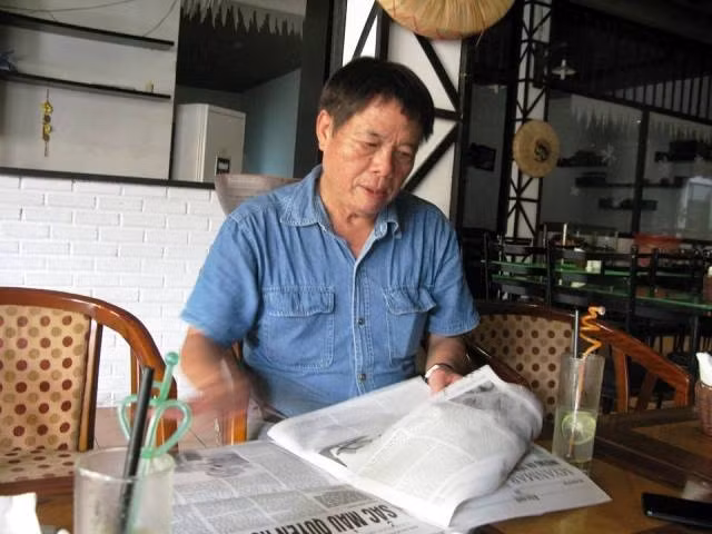 Nghệ sĩ nhiếp ảnh Vũ Huyến.