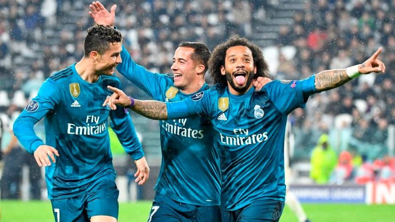 Ronaldo (trái) và Marcelo (phải) cùng tỏa sáng, giúp Real Madrid thắng Juventus 3-0.