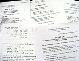 Đơn thư tố giác vợ chồng Vinh - Lan.