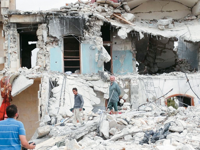 Một góc thành phố Allepo (Syria) sau một đợt không kích của liên quân chống IS.