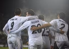 Niềm vui chiến thắng của các cầu thủ Real.
(Ảnh: AFP)