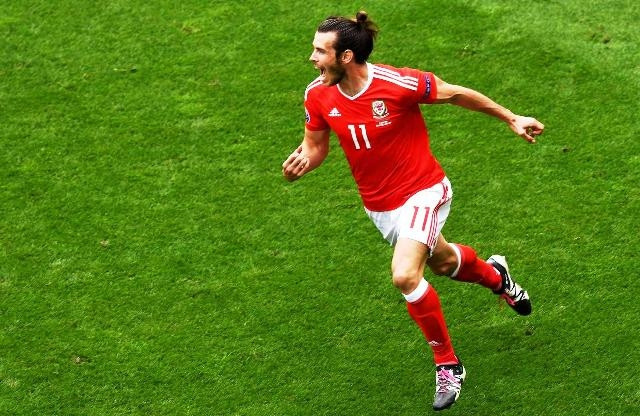Cầu thủ Gareth Bale ăn mừng sau bàn thắng mở tỷ số vào lưới Slovakia. (Ảnh: Getty image)