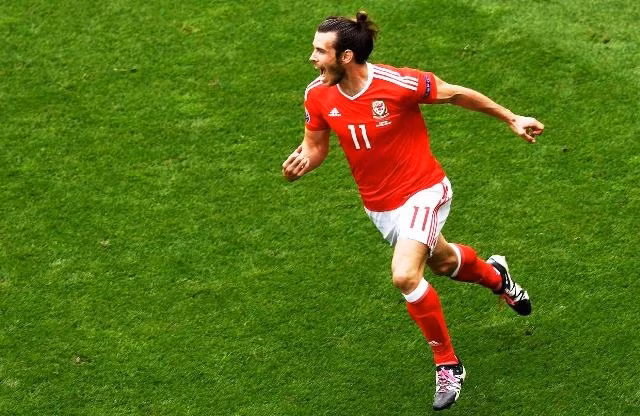 Cầu thủ Gareth Bale ăn mừng sau bàn thắng mở tỷ số vào lưới Slovakia. (Ảnh: Getty image)