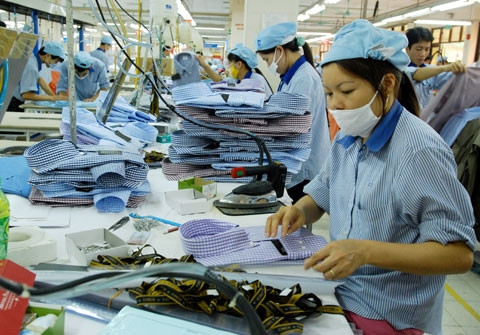 Hiến pháp sửa đổi xác định phát triển kinh tế phải gắn kết với thực hiện tiến bộ, công bằng xã hội. Ảnh:THANH LÂM