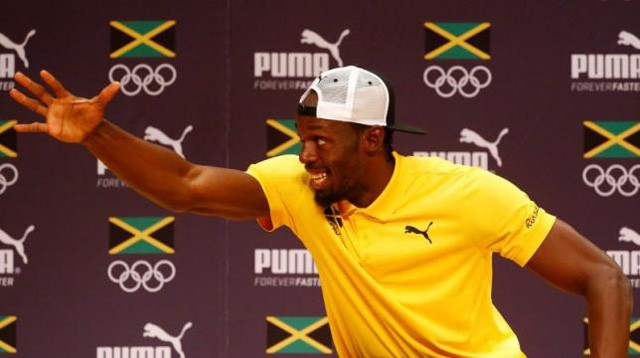 VĐV Jamaica, Usain Bolt tại buổi họp báo. (Ảnh: Reuters)