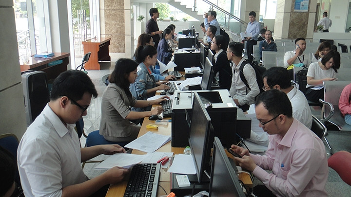 Người nộp thuế làm hồ sơ quyết toán thuế tại Cục Thuế TP Hồ Chí Minh.