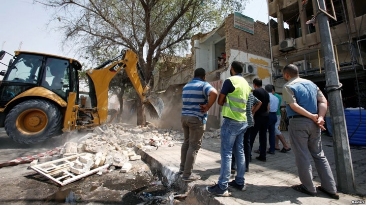 Hiện trường một vụ đánh bom ở Bát-đa, I-rắc.