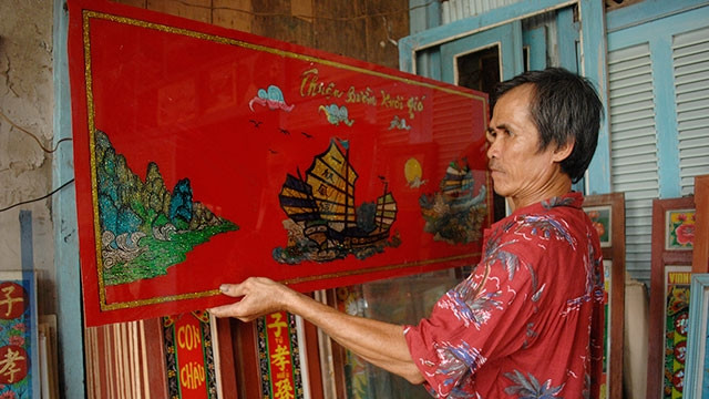 Đây là một phần trong tổng thể một bức tranh mà ông Vinh vừa hoàn thành.