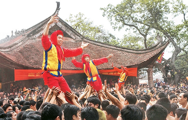 Làng Việt là nơi neo giữ nhiều giá trị tinh thần sống động và đặc sắc. Trong ảnh: Lễ hội làng Đồng Kỵ (Bắc Ninh). Ảnh: HUY HÙNG