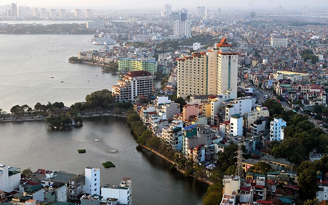 Phát triển công trình xanh sẽ là giải pháp bền vững cho việc giải quyết các vấn đề ô nhiễm môi trường, nâng cao chất lượng cuộc sống người dân đô thị. Ảnh: Ðăng Khoa