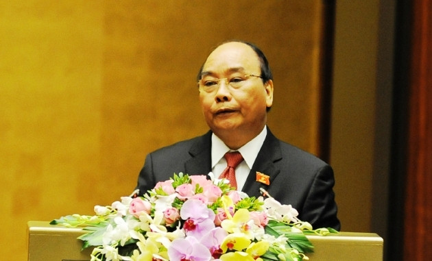 Thủ tướng Nguyễn Xuân Phúc trình bày Báo cáo về kết quả thực hiện kế hoạch phát triển kinh tế - xã hội năm 2017; kế hoạch phát triển kinh tế-xã hội năm 2018.