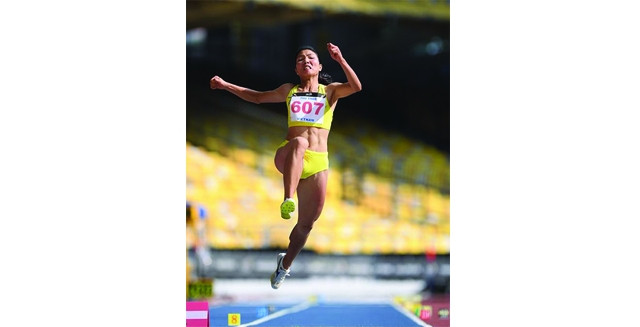 VĐV Bùi Thị Thu Thảo đoạt HCV môn nhảy xa tại ASIAD 2018. Ảnh: MINH CHIẾN