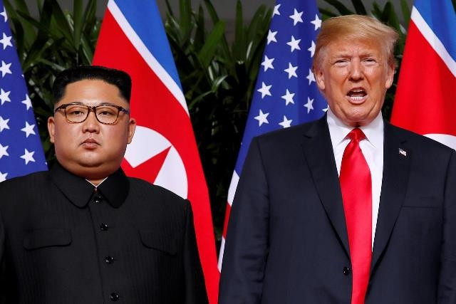Tổng thống Mỹ Donald Trump và Nhà lãnh đạo Triều TIên Kim Jong-un tại Khách sạn Capella trên đảo Sentosa của Singapore, ngày 12-6-2018. (Ảnh: Reuters)