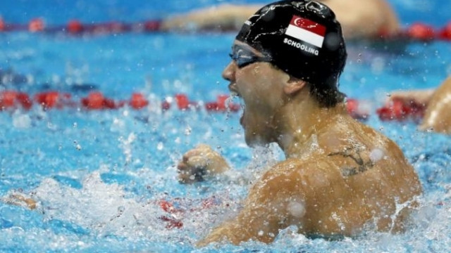 Joseph Schooling ăn mừng chiến thắng. (Ảnh: Reuters)