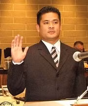 John Trần tại lễ tuyên thệ nhậm chức.