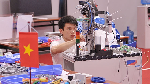 Chú trọng đào tạo nguồn nhân lực chất lượng cao là một trong những yếu tố quan trọng giúp doanh nghiệp phát triển bền vững. Ảnh: HẢI NAM